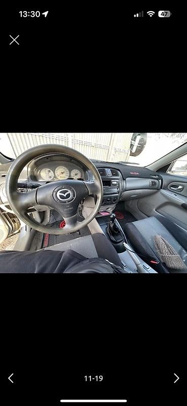 Mazda: Mazda 323: 2004 г., Хэтчбэк — 10