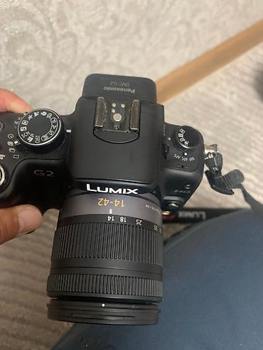 sony lens: Фотоаппарат Panasonic Lumix DMC‑G2 со сменной оптикой Комплект: - — 4