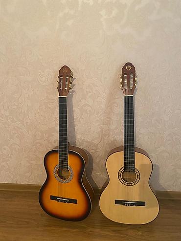 qarmon cantasi: Gitara alinib istifade edilmeyib tezedi ciziqda yoxdu her biri 170 azn — 2