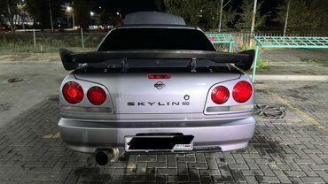 резонаторы: Nissan Skyline: 1999 г., 2.5 л, Механика, Бензин, Седан