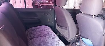дордой мото: Daihatsu Cuore: 2002 г., 1 л, Кол менен иштөөчү, Бензин, Хетчбек — 5