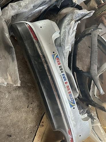 Бампер и комплектующие: Бампер Kia, Оригинал — 50