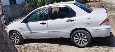 27 5: Mitsubishi Lancer: 2000 г., 1.5 л, Вариатор, Бензин, Седан — 5