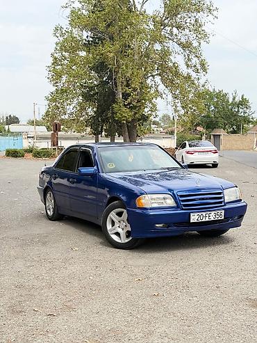 car parking maşın satışı: Mercedes-Benz C-Sinif sedan (W202) — mavi rəng, 4 qapı. Xüsusiyyətlər — 2