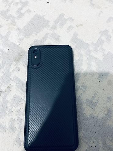 Redmi: Смартфон Redmi 9а (серия A/Go по дизайну). Черный цвет. Основные — 2