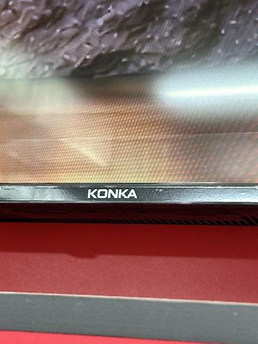 Телевизоры: Телевизор KONKA, диагональ около 55–60". Тонкие рамки, устойчивые — 2