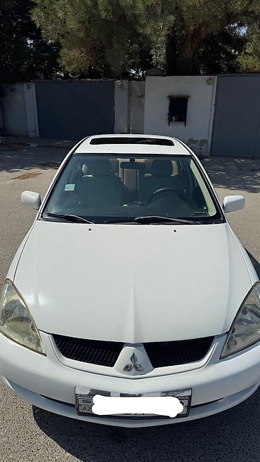 misin: Mitsubishi Lancer: 1.6 l | 2007 il 313000 km Sedan — 8