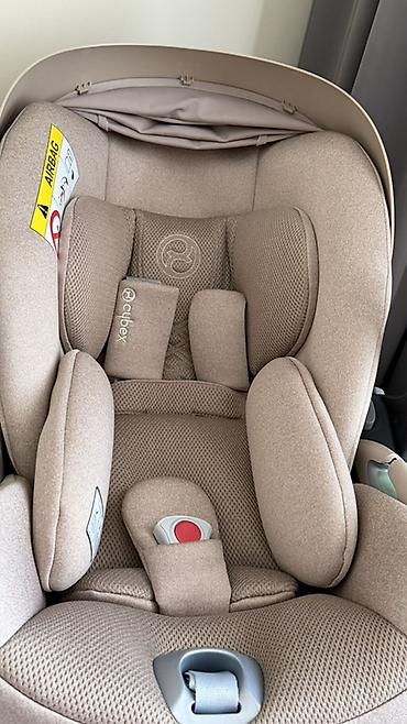 hipseat: Детское автокресло-переноска Cybex (группа 0+) в бежевом цвете — 5