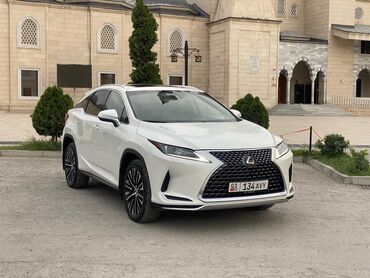лексус rx 330 новый цена: Белый кроссовер Lexus RX 350 с плавными линиями кузова и динамичным
