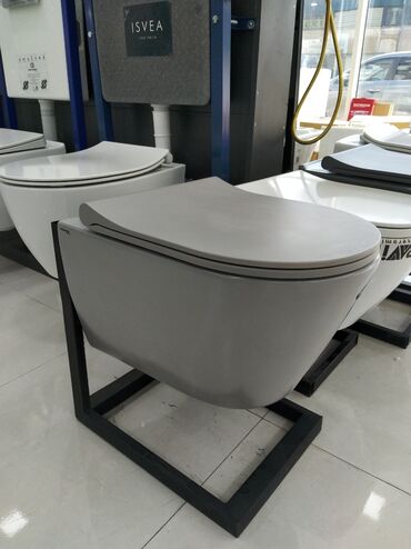 hamam vannalar: Divar asma unitaz – mat boz rəngdə, minimalist dizayn. Xüsusiyyətlər