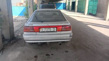 глушитель мазда 626: Mazda 626: 1991 г., 2.2 л, Механика, Бензин, Седан