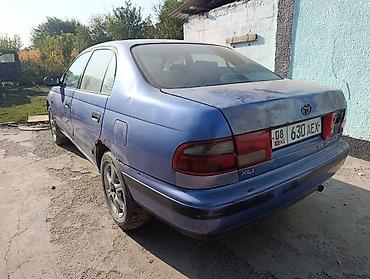 авто чанган: Toyota Carina E: 1997 г., 1.6 л, Кол менен иштөөчү, Бензин, Седан — 2