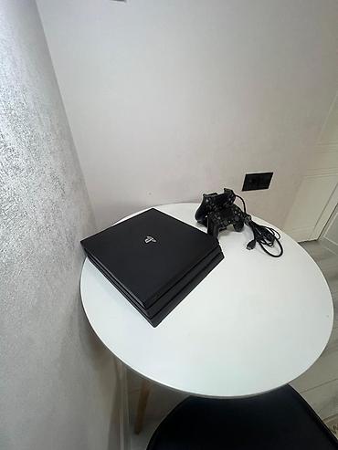 PS4 (Sony PlayStation 4): PlayStation 4 Pro (черный) Комплектация: - игровая консоль PS4 Pro — 1