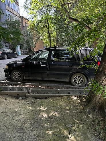 машина кроссовер: Mitsubishi Space Wagon: 1999 г., 2.4 л, Механика, Бензин, Универсал — 5