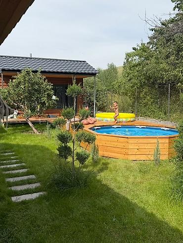 дачи в байтике: Дом-дача с панорамным остеклением . - Фасад под брус, современная — 6