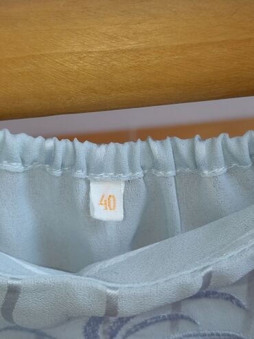 Bluze: Nova, vežena bluza sa širim bretelama vel. 40, L,, svetlo plava, ima — 11