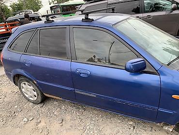 mazda cx: Mazda Protege: 2001 г., Универсал — 4