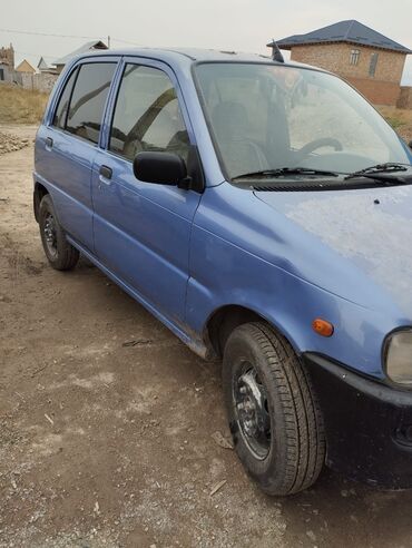 авто россрочка: Daihatsu Cuore: 1995 г., 0.8 л, Механика, Бензин, Хэтчбэк