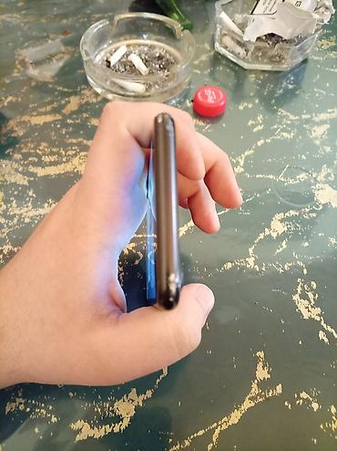 Apple iPhone: IPhone 7, 128 GB, Qara — 5