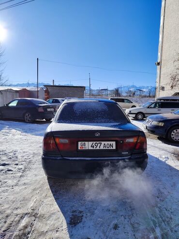 Mazda: Mazda 323: 1996 г., 1.5 л, Автомат, Бензин, Седан