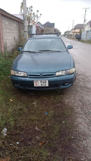 карапка: Mazda Cronos: 1992 г., 2 л, Механика, Бензин, Хэтчбэк