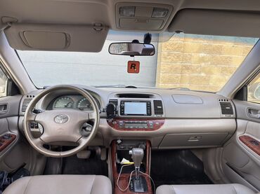 торговое оборудование бу бишкек: Интерьер автомобиля Toyota Camry с бежевым салоном и деревянными