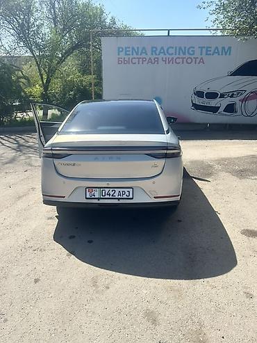 Другой электротранспорт: Электромобиль AION S Plus - Кузов: седан, серебристый цвет - Задние — 2