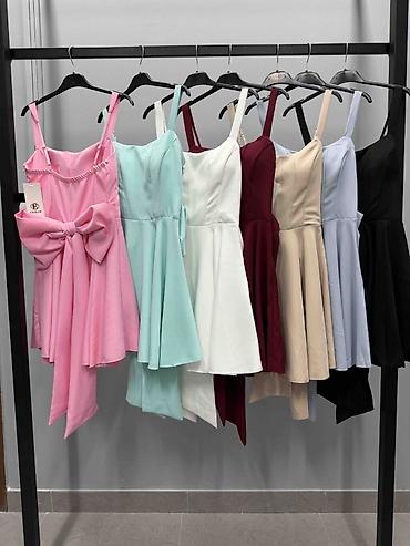 Haljine: 🔥Koktel haljina sa velikom mašnom na leđima
✅2500 din — 9