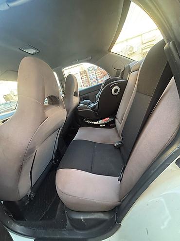 kovş: Subaru Impreza: 2 l | 2007 il 301000 km Sedan — 8