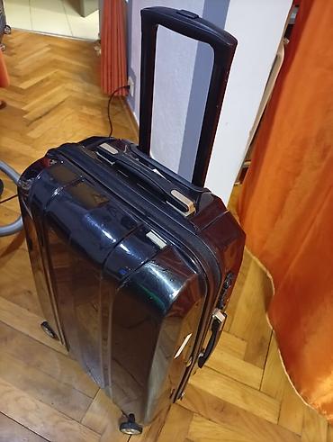 Putni koferi i torbe: Tvrdi kofer sa 4 točka, crne boje OKO. 65 40 25. MIRJEVO - — 9