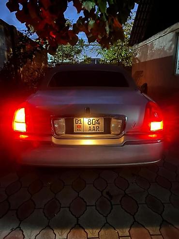 lincoln: Лимузин Lincoln Town Car Stretch, серебристый цвет. Ключевые — 7