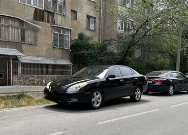 а4 б5: Чёрный седан Lexus ES 300. Автомобиль отличается элегантным дизайном и