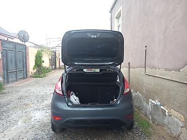 tap.az lada: Ford Fiesta hatchback — tünd boz rəng, 5 qapı. Xüsusiyyətlər: - — 2