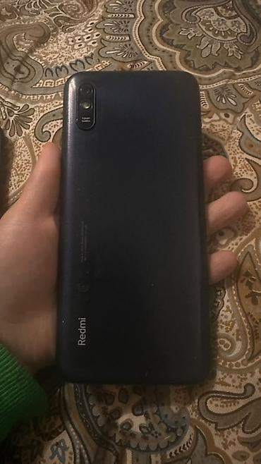 tp link 4g: Смартфон Redmi в чёрном цвете. На фото видно большой экран с — 2