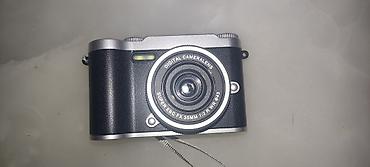 Фотоаппараты: Компактная цифровая камера - Форм‑фактор мини-«ретро» с ремешком на — 1