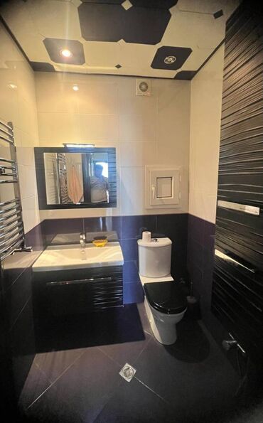 Uzunmüddətli kirayə mənzillər: 9-mikrorayonda Tərlan Şadlıq sarayının yanında 20 mərtəbəli binanın — 12