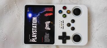 Digər oyun və konsollar: Portativ retro oyun konsolu - Korpus: ağ rəng, yığcam qatlanan — 1