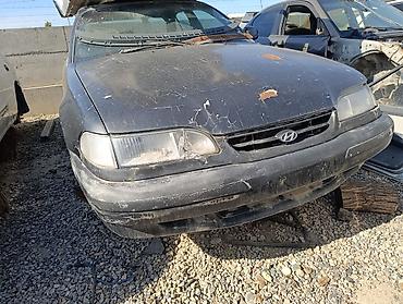 aimb g3: Hyundai Sonata (ок. середины 90‑х), седан, черный цвет. Автомобиль на — 1