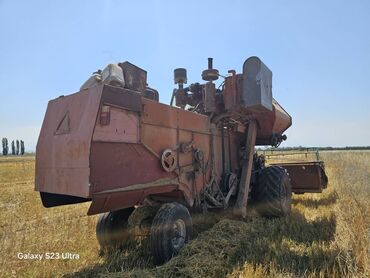 куплю трактор т 25 недорого: Зерноуборочный комбайн СК-5 «Нива» бордового цвета, предназначенный