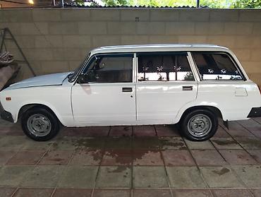 nomre qablari: Lada 2104, ağ rəngli universal kuzov Texniki xüsusiyyətlər: - Kuzov — 6