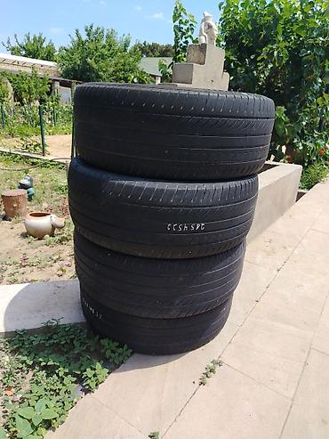 təkər 235 60 18: 4 ədəd minik avtomobili üçün yay təkəri. Təkərin 1 ədədində yüngül şiş — 1