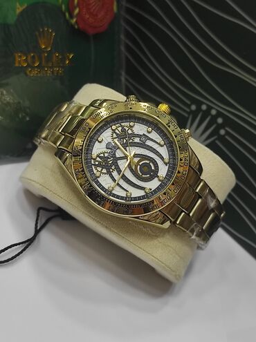 pul qabi: Yeni, Qol saatı, Rolex