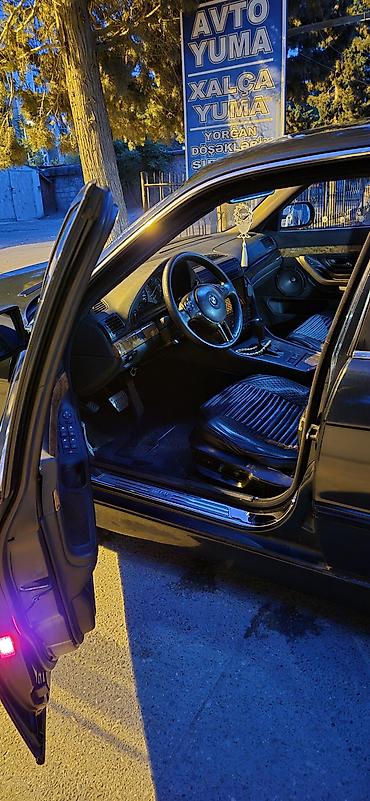bmw e38: BMW 7 Series E38 sedan - Kuzov: qara rəng, klassik E38 dizaynı, ön və — 3