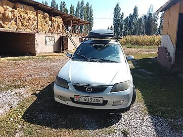авто салон: Mazda 323: 2002 г., 1.6 л, Механика, Бензин, Универсал — 2