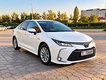Toyota: Toyota Corolla: 2021 г., 1.8 л, Автомат, Гибрид, Седан — 2
