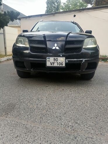 islenmis kvadrasikl: Mitsubishi Outlander: 2.4 l | 2003 il 267920 km Ofrouder/SUV