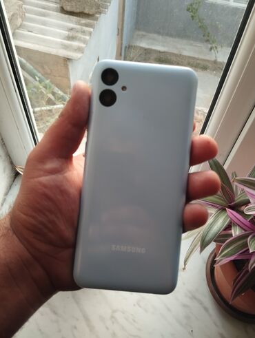 telefonlar samsunq: Samsung Galaxy A04, 32 GB, rəng - Göy, Düyməli, Sensor, Simsiz şarj