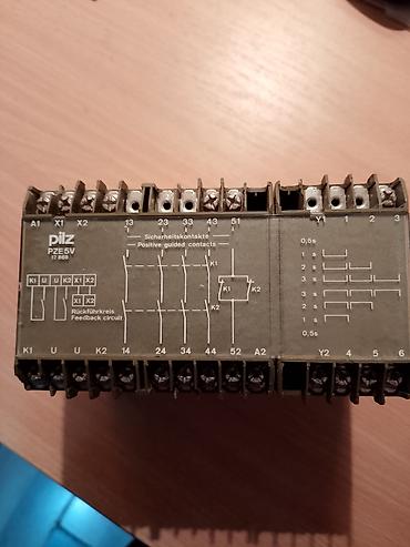 gobleni katalog: Pilz PZE5V- Zaštitni rele (safety relay) za mašinsku zaštitu - Model — 1