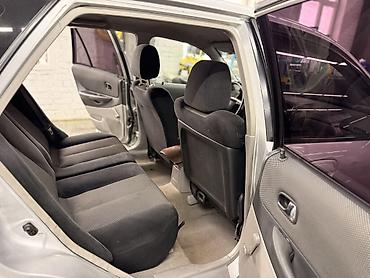 Mazda: Mazda 323: 2003 г., 1.6 л, Механика, Бензин, Универсал — 14