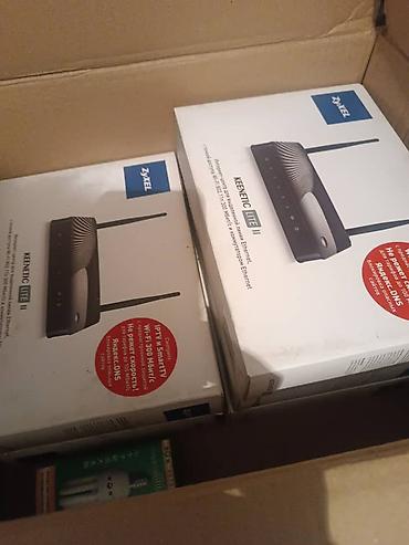пассивное сетевое оборудование lucom: Wi‑Fi роутеры ZyXEL Keenetic Lite II + управляемые коммутаторы D‑Link — 2